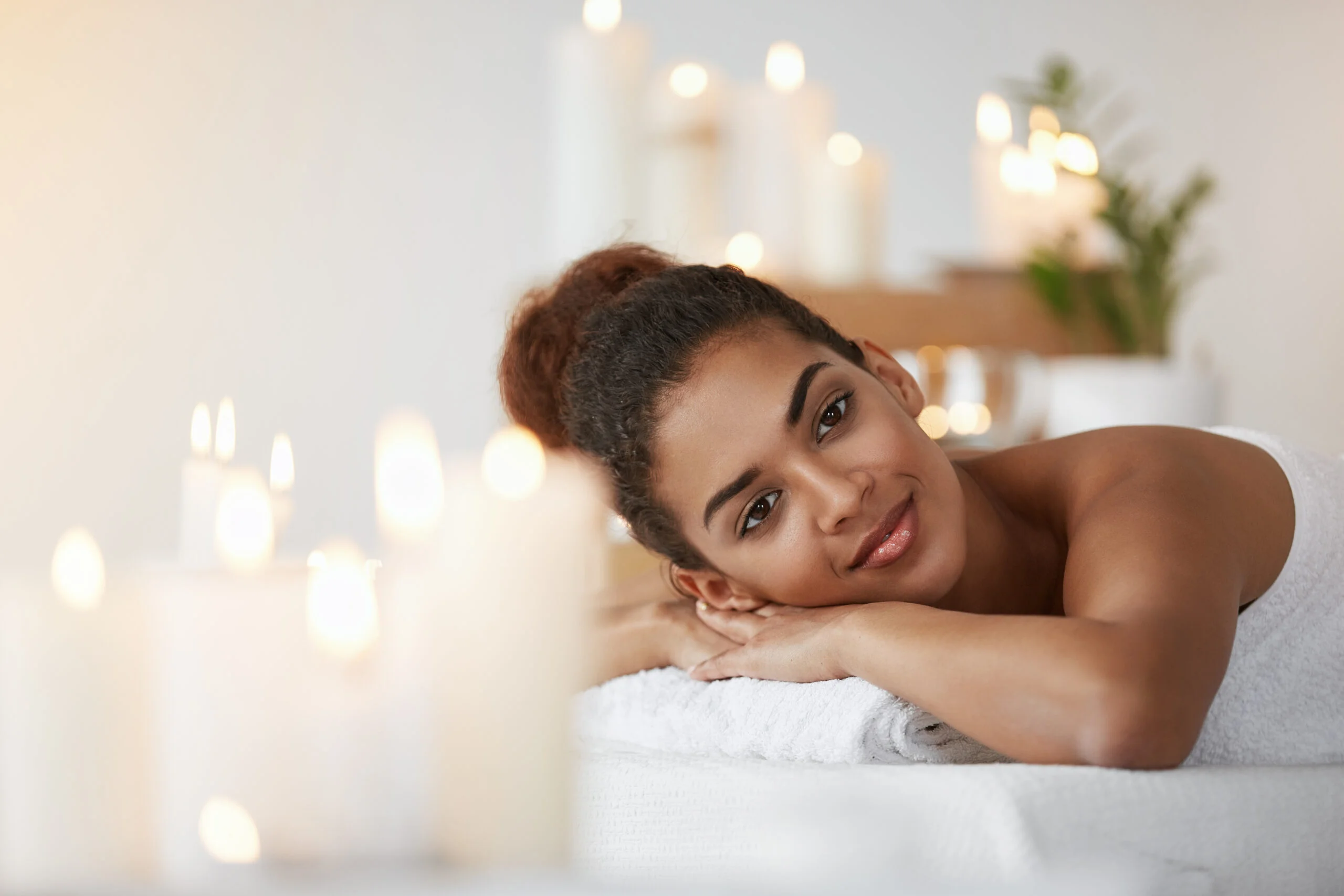 https://houstonmobilemassages.com/wp-content/uploads/2023/11/beautiful-african-woman-smiling-resting-relaxing-spa-salon-scaled.jpg.webp